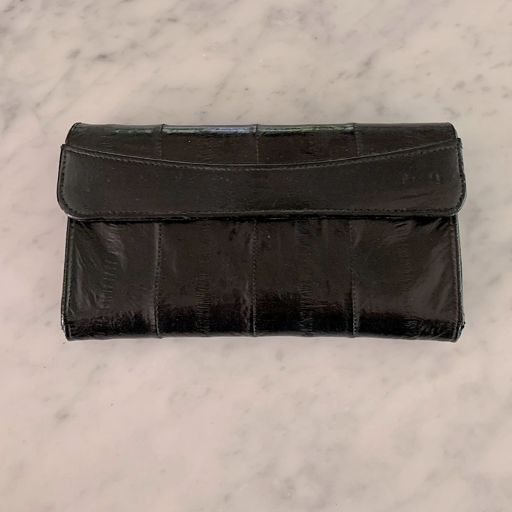 Eel skin wallet in black with card and coin compartments 7” x 4”